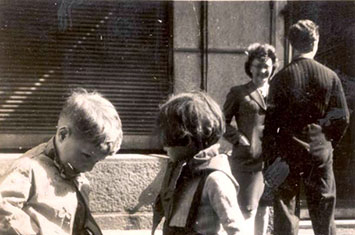 Children at the home in Chamonix dressed up for Mardi Gras, 1943-1944. At the foot of the photo are the words: "Miss, would you like to dance?"