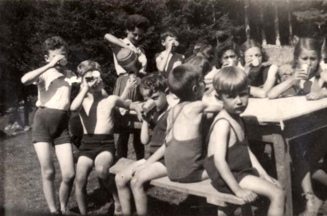 Children at the home in Chamonix eating in the open air, 1943-1944