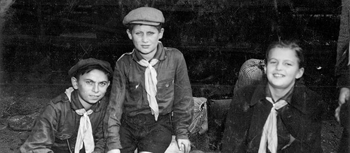 Three child survivors of the Holocaust, about to board a train along the route of the Bricha. Czechoslovakia Three child survivors of the Holocaust, about to board a train along the route of the Bricha. Czechoslovakia