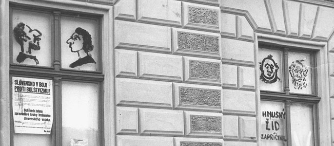 Slovakia, Antisemitic graffiti and caricatures on the windows of a building Slovakia, Antisemitic graffiti and caricatures on the windows of a building