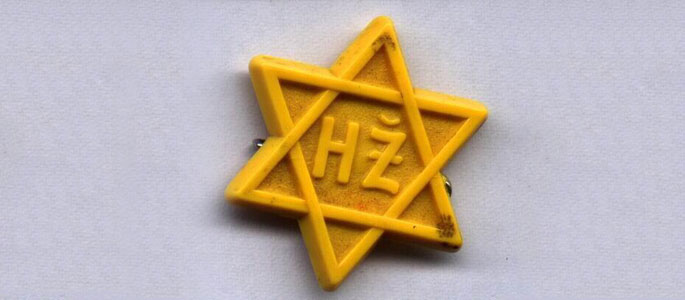 A pin used to identify Slovakian Jews who had been granted ‘certificates of exemption’ A pin used to identify Slovakian Jews who had been granted ‘certificates of exemption’