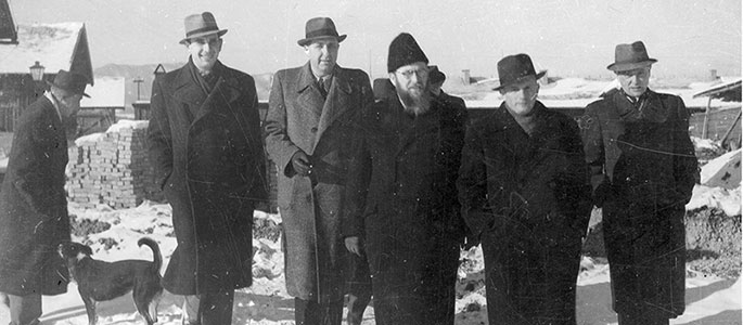 Members of the Jewish Committee in the Nováky forced labor camp, together with one of the rabbis from the Working Group Members of the Jewish Committee in the Nováky forced labor camp, together with one of the rabbis from the Working Group