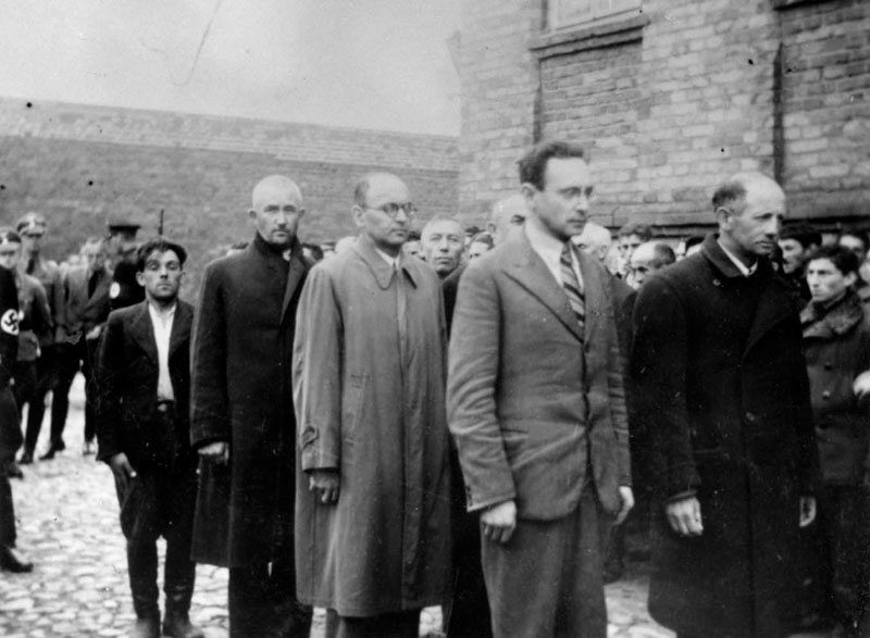 Registration of Jewish men in the courtyard of the Plonsk prison, while being beaten, 19 September 1939 Registration of Jewish men in the courtyard of the Plonsk prison, while being beaten, 19 September 1939