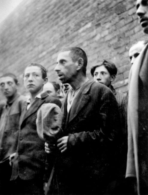 Registration of Jewish men in the courtyard of the Plonsk prison, while being beaten, 19 September 1939 Registration of Jewish men in the courtyard of the Plonsk prison, while being beaten, 19 September 1939