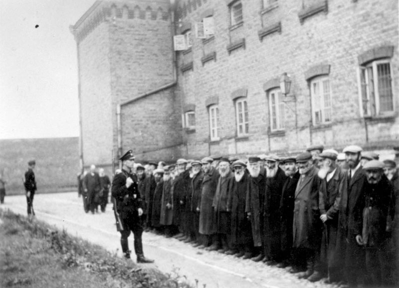 Registration of Jewish men in the courtyard of the Plonsk prison, while being beaten, 19 September 1939 Registration of Jewish men in the courtyard of the Plonsk prison, while being beaten, 19 September 1939