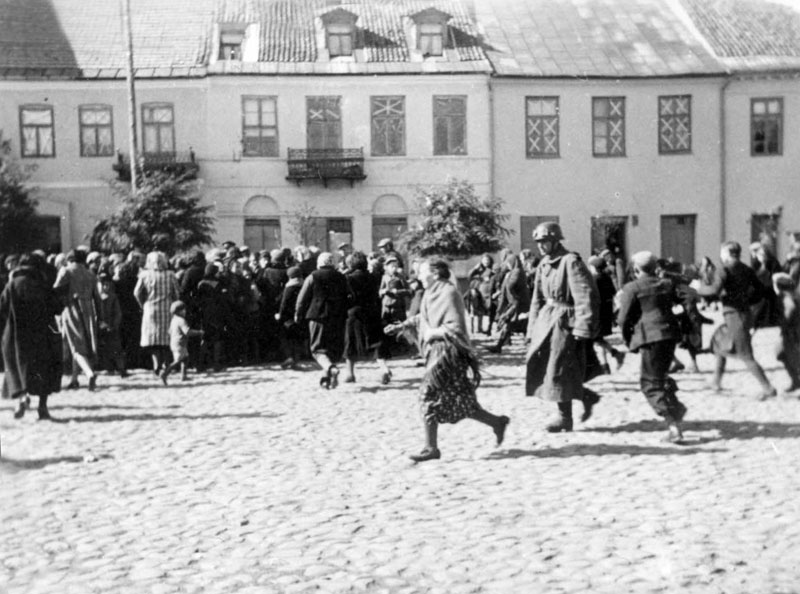 Registration of Jewish men in the courtyard of the Plonsk prison, while being beaten, 19 September 1939 Registration of Jewish men in the courtyard of the Plonsk prison, while being beaten, 19 September 1939