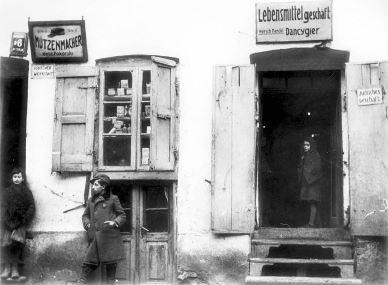 Plonsk , 1940. Businesses with signs declaring that they are owned by Jews Plonsk , 1940. Businesses with signs declaring that they are owned by Jews