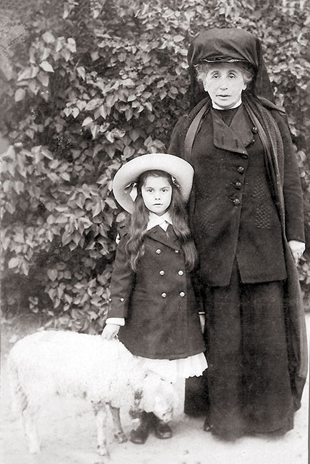 Young Sofka, with her grandmother and a lamb Young Sofka, with her grandmother and a lamb