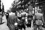 Jewish and German policemen in the streets of the Warsaw Ghetto, 7 August 1942 Jewish and German policemen in the streets of the Warsaw Ghetto, 7 August 1942
