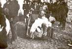 An old woman being taken to the collection point during the deportation of the Warsaw Ghetto Jews to Treblinka, July-August 1942 An old woman being taken to the collection point during the deportation of the Warsaw Ghetto Jews to Treblinka, July-August 1942