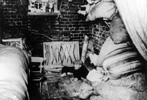 A Jew inside a bunker used for hiding during the Warsaw Ghetto uprising, April-May 1943 A Jew inside a bunker used for hiding during the Warsaw Ghetto uprising, April-May 1943