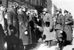 A group of Jews captured by the Germans during the suppression of the Warsaw Ghetto uprising. The subtitle under the original photo in the Stroop album reads: "Jewish Rabbis" A group of Jews captured by the Germans during the suppression of the Warsaw Ghetto uprising. The subtitle under the original photo in the Stroop album reads: "Jewish Rabbis"