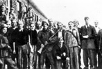 August 1944: a group of prisoners, liberated from the Gęsiówka camp by the Batalion Zośka (a Scouting battalion of the Polish Resistance organisation - Home Army) August 1944: a group of prisoners, liberated from the Gęsiówka camp by the Batalion Zośka (a Scouting battalion of the Polish Resistance organisation - Home Army)