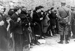 Jews who were taken from bunkers by SS soldiers during the suppression of the Warsaw Ghetto uprising Jews who were taken from bunkers by SS soldiers during the suppression of the Warsaw Ghetto uprising