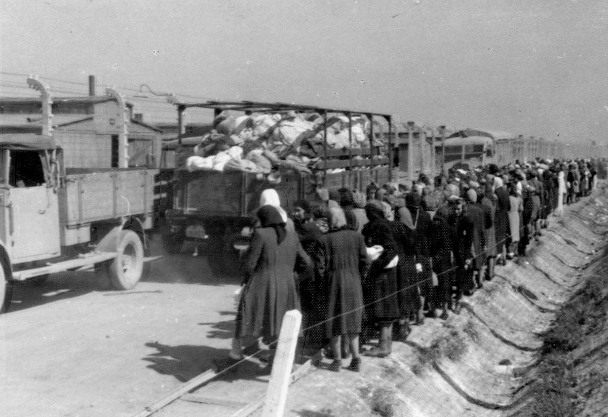 Trucks transport confiscated property to the "Kanada" section