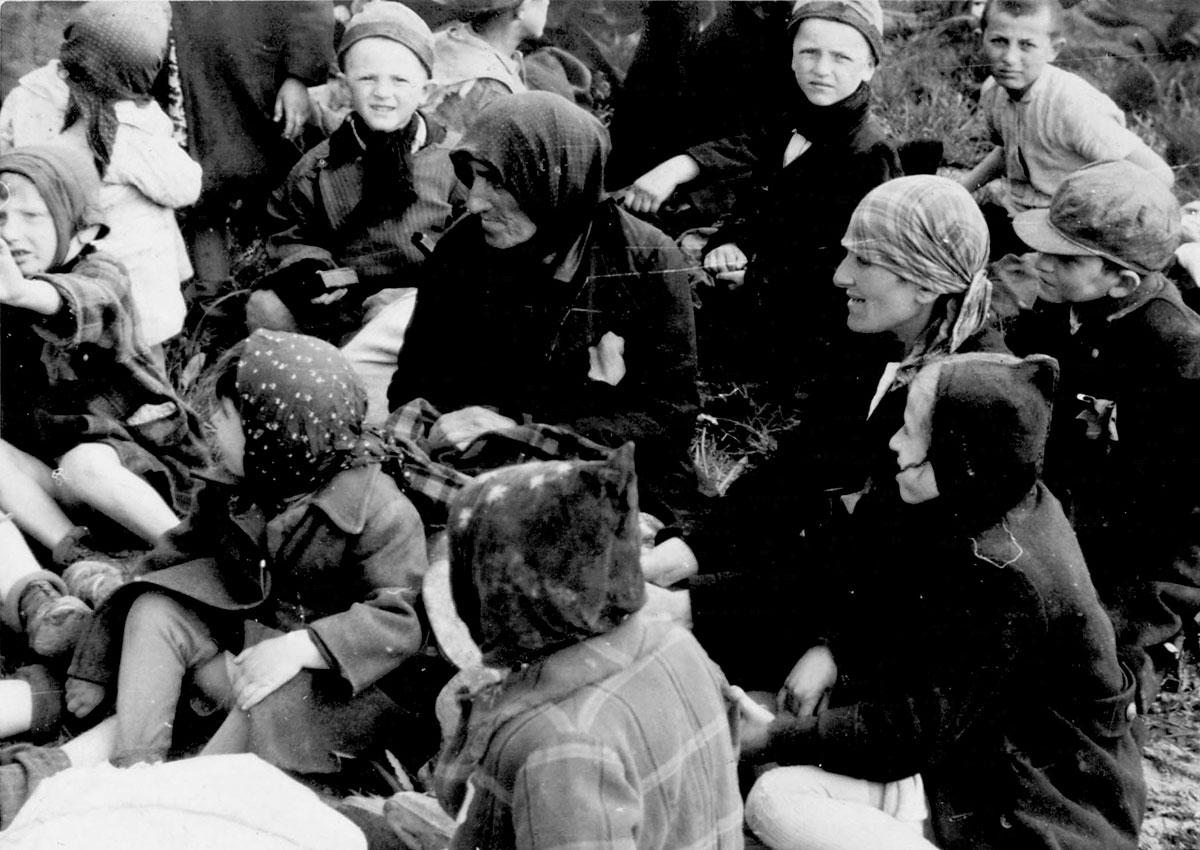 More scenes of the peaceful interval in the grove before the Jews are driven into the undressing room
