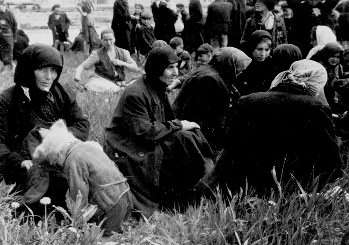 More scenes of the peaceful interval in the grove before the Jews are driven into the undressing room