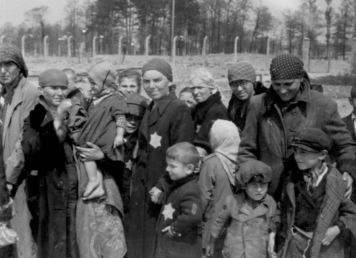 Jewish women and children forced to walk to the grove
