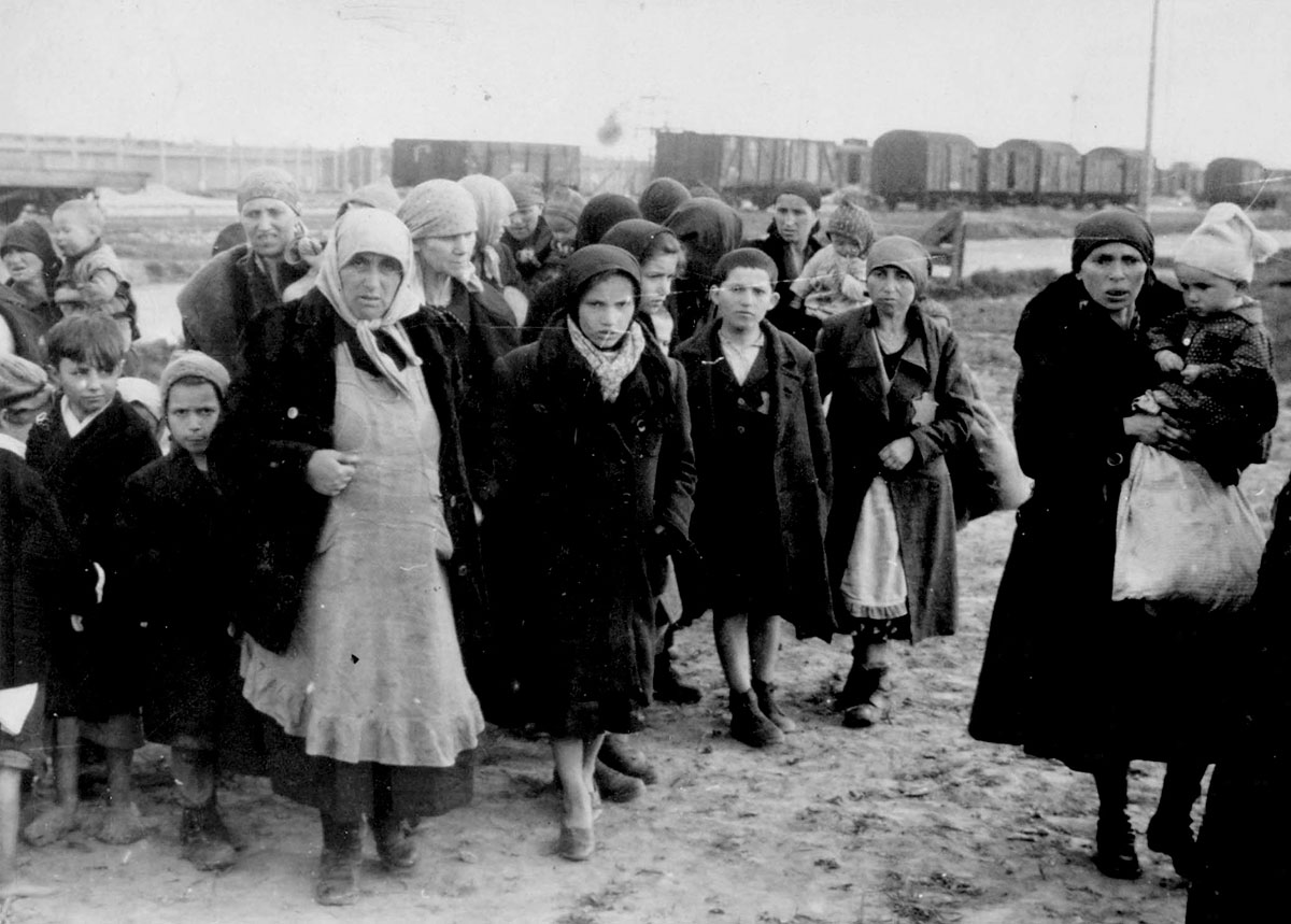 Jewish women and children forced to walk towards the gas chambers