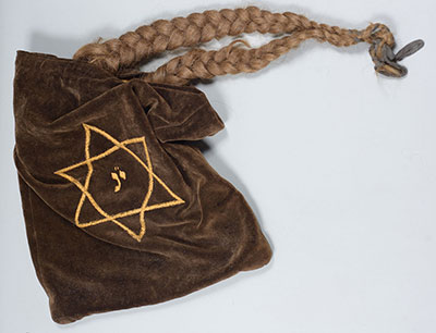 The braids of Lili Hirsch, who was deported with her family to Auschwitz and murdered