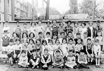 Group photo of pupils and their teacher in a Jewish school, the Netherlands