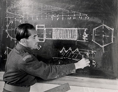 A teacher at the "ORT" school in the DP camp, Bergen-Belsen, Germany, postwar