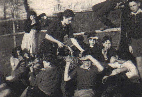 Children hidden at the home in Chabannes. Center – a girl holding a wicker basket