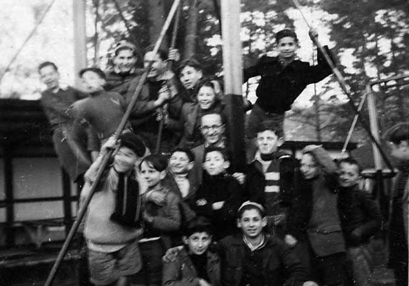 Eliyahu Feynaro and his friends at the "Ilania" children's village in Apeldoorn, the Netherlands, on a nature trip.  Summer 1948