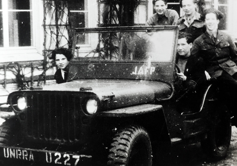 Boys from the "Hulda" group in an UNRRA jeep at the children's home in Blankenese, Hamburg, Germany, 1946-7
