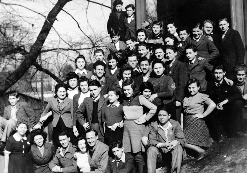 Eliyahu Ben Yehuda (Erich Stiefel) with a group of children and staff at the children's home in Blankenese, Hamburg, Germany, 1945