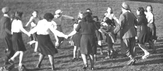 Members of Bnei Akiva and their youth leaders dancing the "Hora". Bratislava, 1946