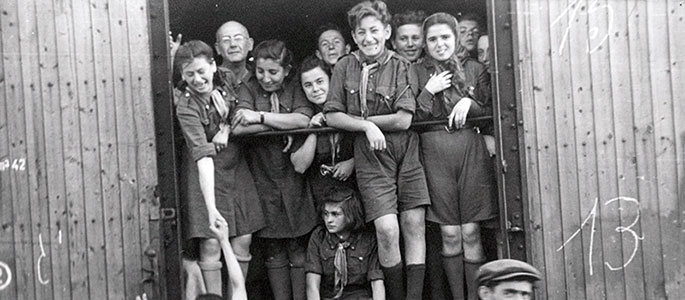 Members of a youth movement traveling by train to Bratislava, 1946