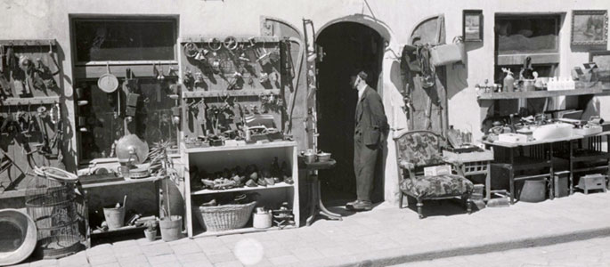 A Jewish merchant and his wares in the Jewish Quarter of Bratislava, before the war
