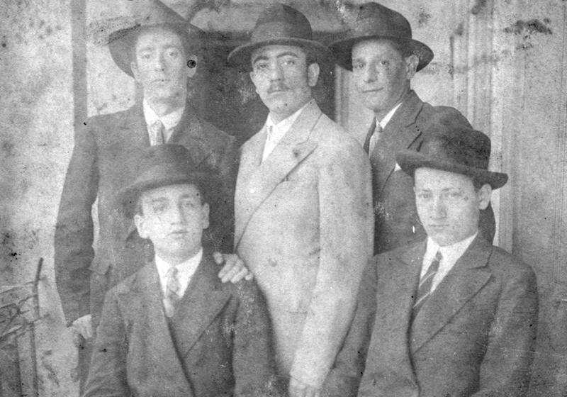 The Scharf brothers and colleagues at a factory for manufacturing store blinds.  Beclean, Romania, c. 1930