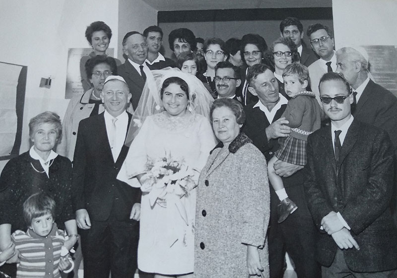 Photograph from the wedding of Shoshana Aufrecht and Chaim Isaac Landoy (wearing white yarmulke), 14 October 1967, Jerusalem