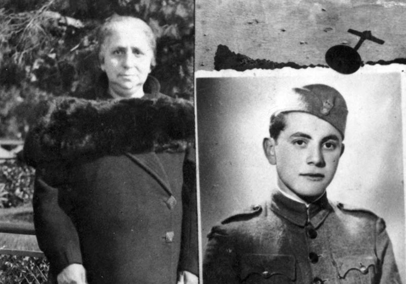 Esther Mahel next to a portrait of her son, Siman-Tov Mahel (Zvi Michaeli) in Greek Army uniform.  Thessaloniki, 1939