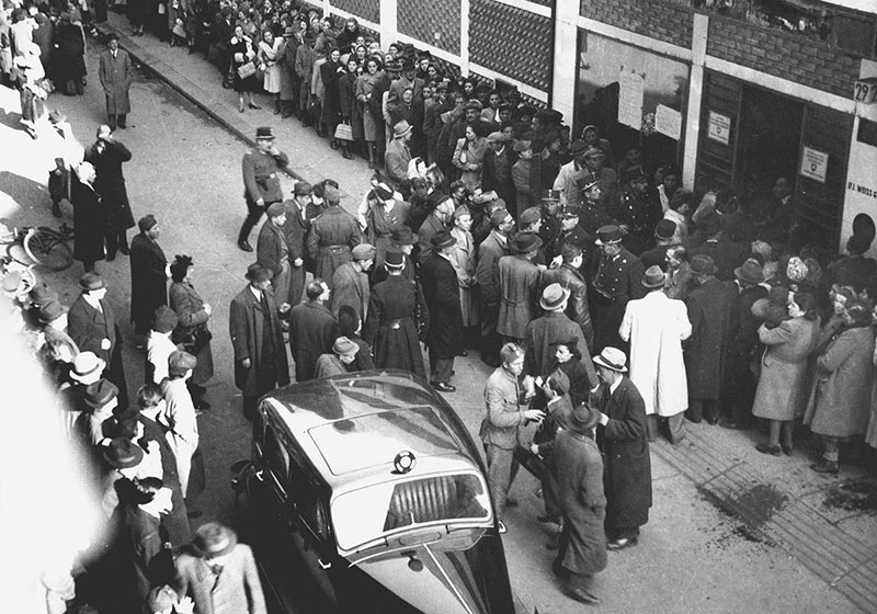 Jews standing in line to receive Swiss letters of protection. The "Glass House", 29 Vadász Street, Budapest, 1944