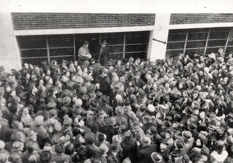 Jews gathered in front of the "Glass House", 29 Vadász Street, to receive Swiss letters of protection. Budapest, 1944