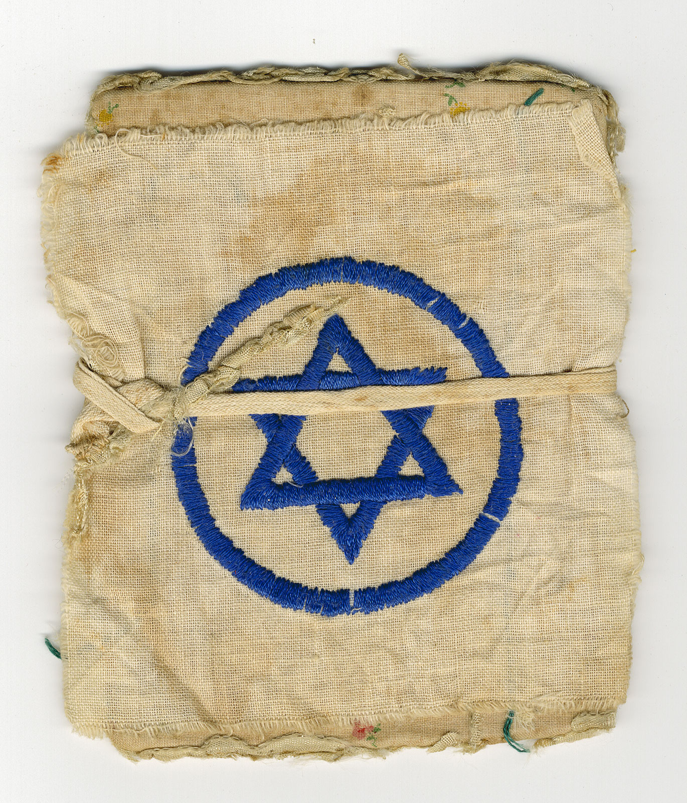 Star of David embroidered by Regina Goldach prior to her planned departure for the Maccabiah games