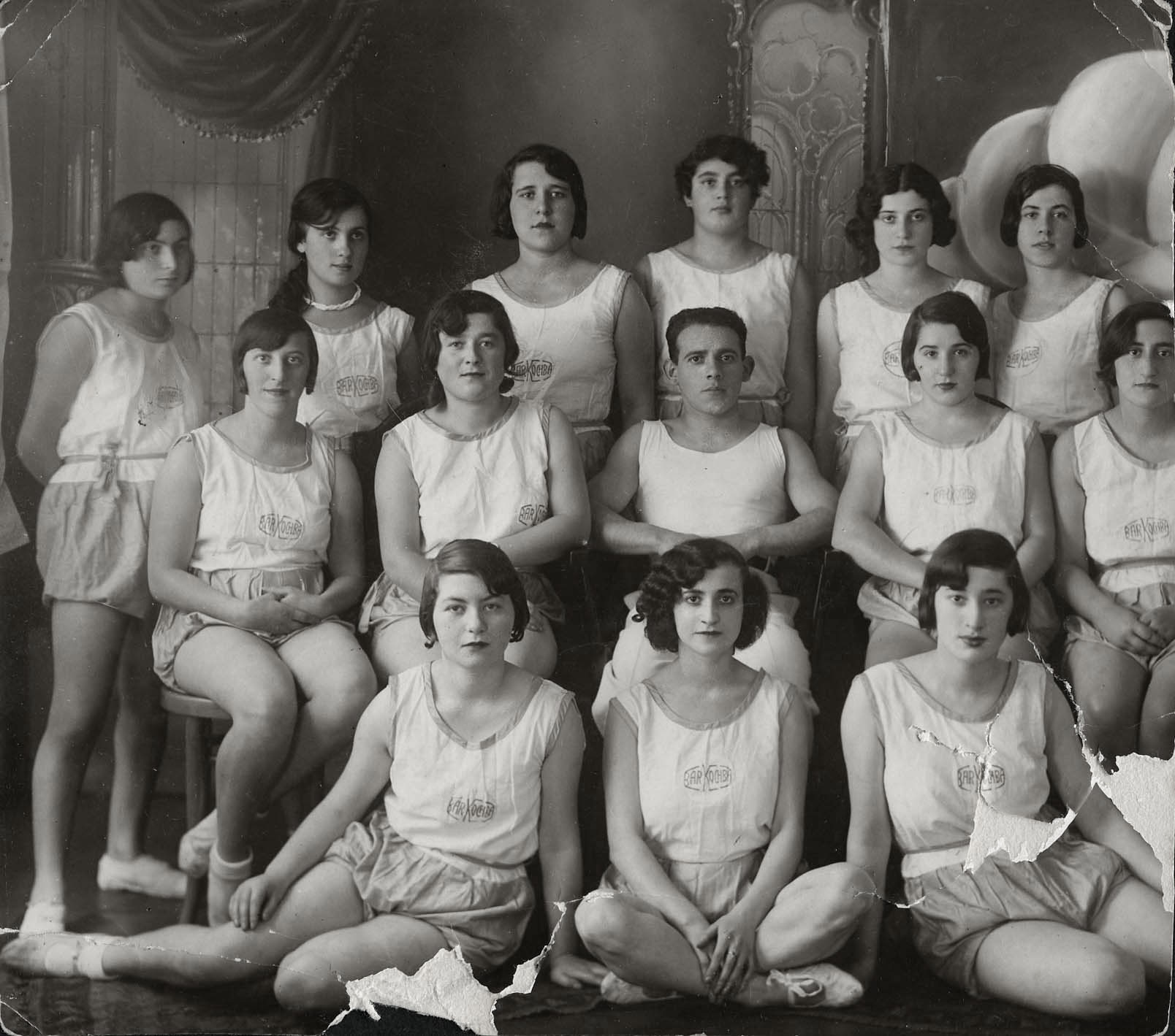 Local women's gymnastics team, Lodz, Poland. Hadasa Kleczewski (née Wolkovitz) is sitting in the middle of the first row.