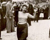 Львов, Украина, 30/06/-03/07/1941. Погром. Женщина на коленях, с поднятыми руками.