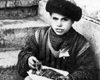 Каунас, Литва. Мальчик, продающий семечки.