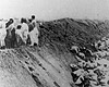 Лиепая, Латвия, 15/12/1941. Женщины и дети у края расстрельного рва, перед казнью.