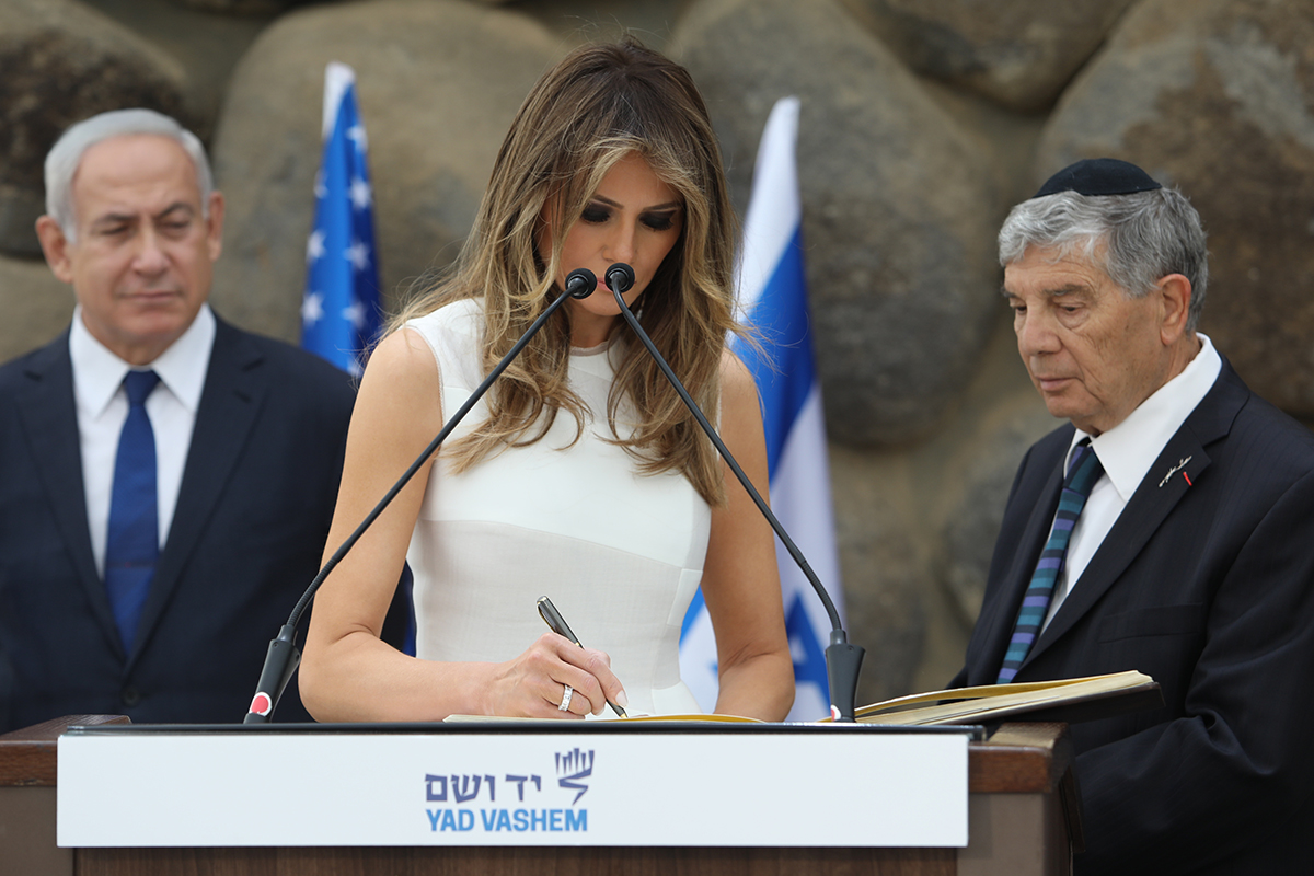 First Lady Melania Trump signs the Visitors' Book