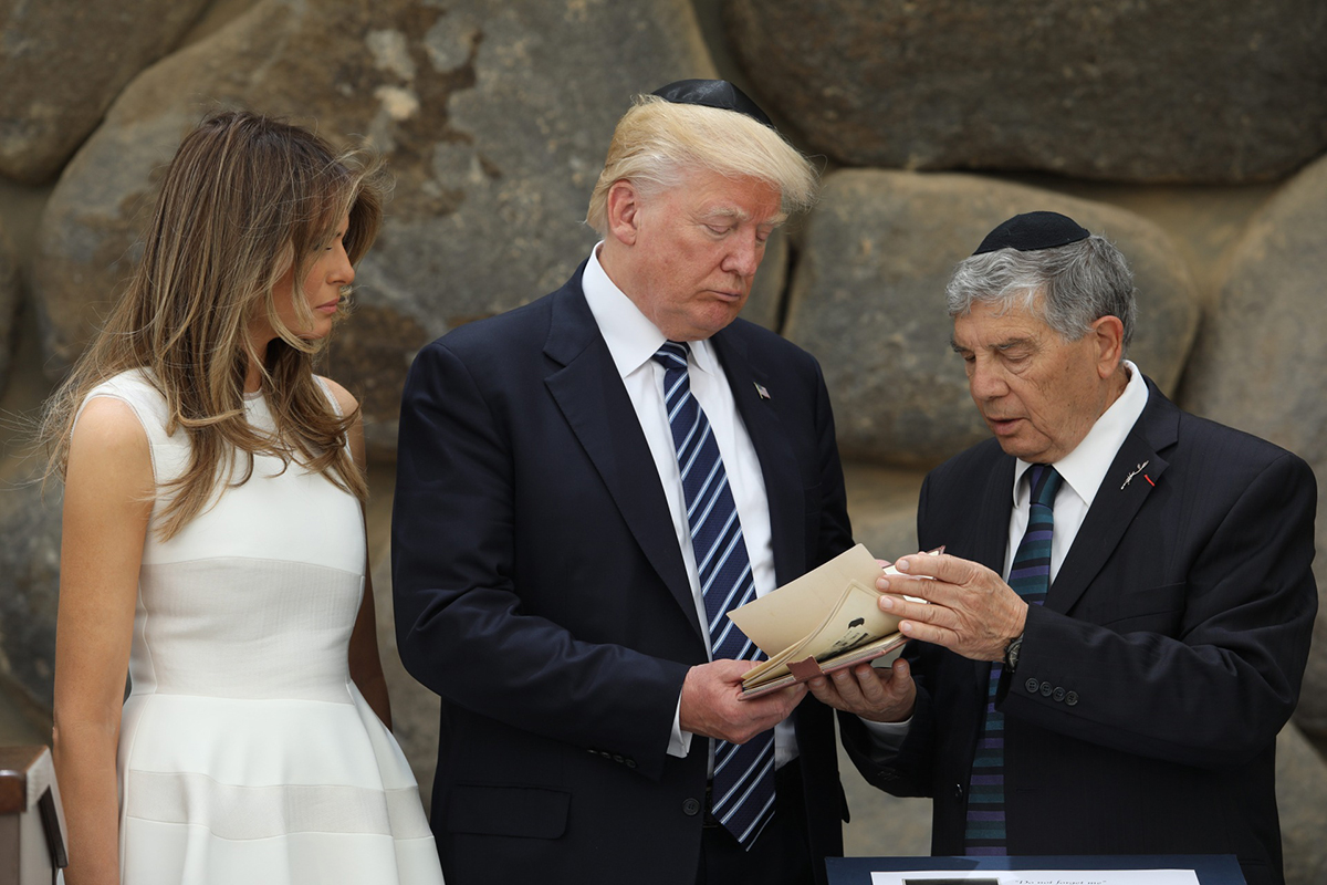 Avner Shalev, Chairman of the Yad Vashem Directorate presenting President Donald J. Trump with a replica of Ester Goldstein’s personal album